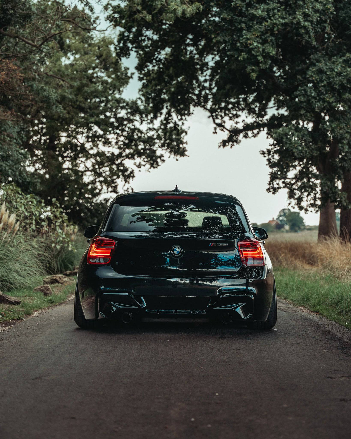 F20 F21 Pre-LCI ZAERO EVO-1 Gloss Black Body Kit 4-Piece (Front Lip, Side Skirts, Rear Diffuser, Spoiler) - Part No. ZE-F20-GB