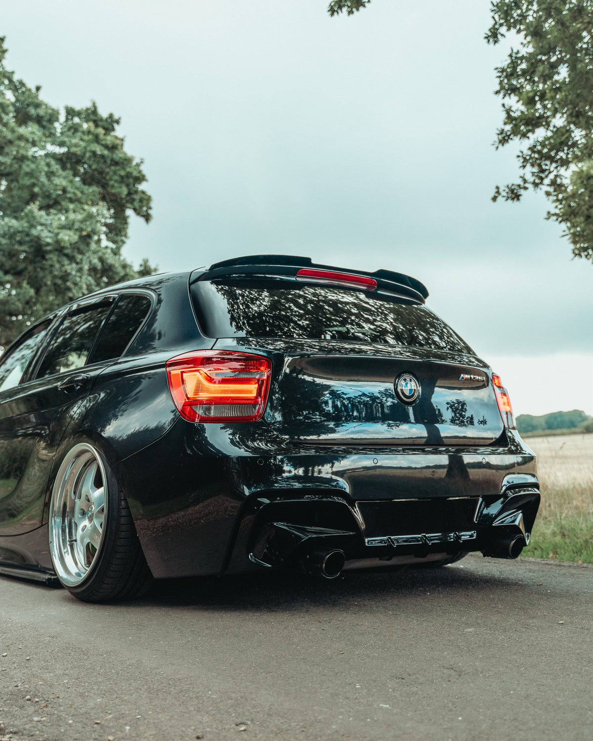 F20 F21 Pre-LCI ZAERO EVO-1 Gloss Black Body Kit 4-Piece (Front Lip, Side Skirts, Rear Diffuser, Spoiler) - Part No. ZE-F20-GB